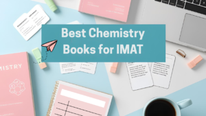 Best chemistry books for quick IMAT revision arranged on a study desk with notes, flashcards, and a laptop, showing a clean and focused study setup for IMAT preparation.